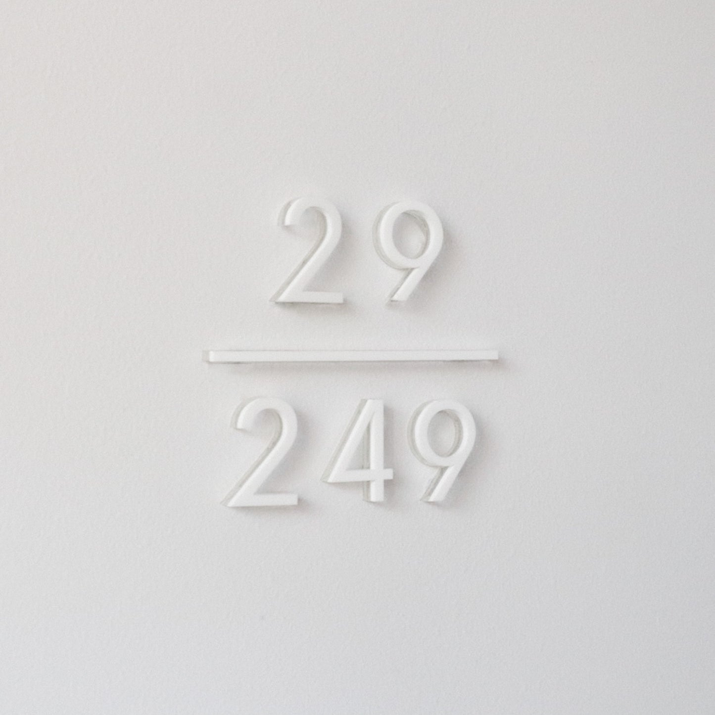 Aria unit sign in matte white acrylic