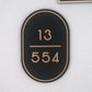 ADELE Unit Number Sign (with border)