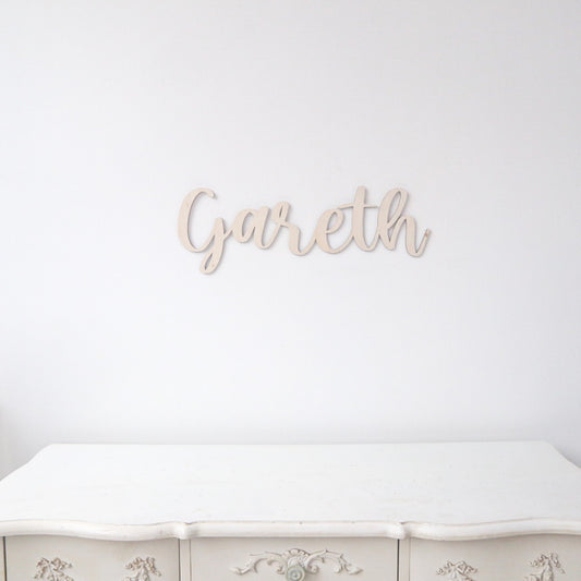 50cm name calligraphy in natural plywood, as a baby room name sign.
